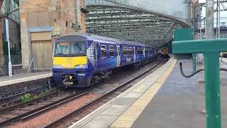 Class 320 departs Glasgow Central