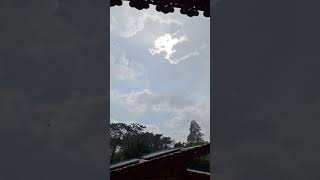 Rain falling on a sunny day