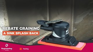 Rebate graining on a sink splash back with the Dynaline in-line sander