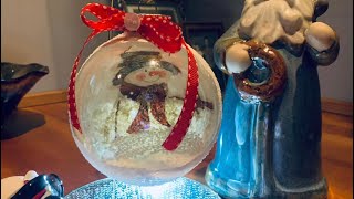 How to craft on a glass ornament using then reverse decoupage method