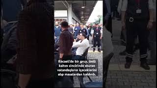 Kocaeli’de bir grup, Starbucks’ta oturan vatandaşların içeceklerini alıp masalardan kaldırdı.