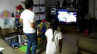 Mom and Miquela playing Kinect