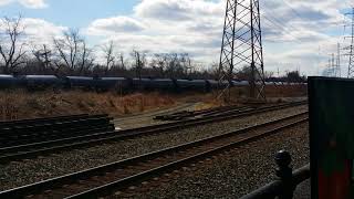 Norfolk Southern tanker train with Canadian Pacific locomotives train Passing Bound Brook