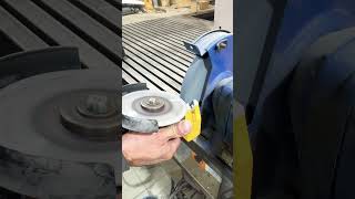 use a grinder to straighten the sharpening disk