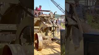 Ancient Steam Traction Engine Working Hard Pulling A Road Grader Up Hill