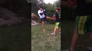 muay thai pad works with junior fighter