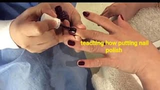 teaching putting nail polish