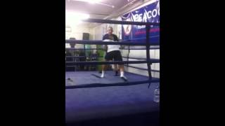 George Hennon on pads with trainer Johnny Greaves at the Peacock Gym