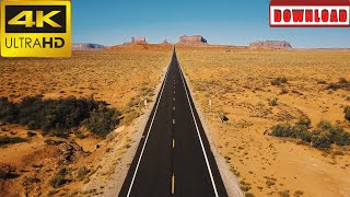 🎁4K Drone flying backwards over iconic empty Sandstone desert road in Arizona | DAILY NATURE FOOTAGE