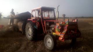 MASSEY FERGUSON MF 360 working on wheat tharisher