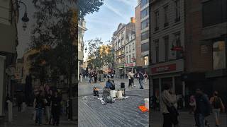 Brussels Street Music: Watch This Artist Turn Pipes into a Symphony!