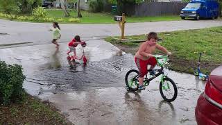 Jonathan, Trevor, & Karter playing in the rain. 😊❤