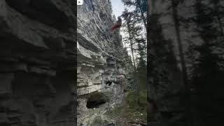 Girl and boy rock climber collide in the middle