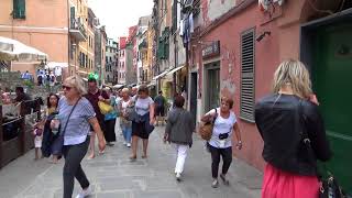 Walking along the main road of Vernazza, Cinque Terre, Italy