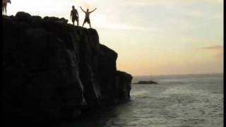 Jumping off The Rock at Waimea Bay, Hawaii