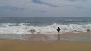 Paddle surfers New Port Beach: more swallowed than surfed