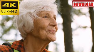 🎁4K Beautiful senior woman smiling and enjoying view during hiking in forest | DAILY NATURE FOOTAGE