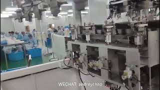 Full automatic medical connecting tube IV infusion tube assembling coiling PE bag packing machine