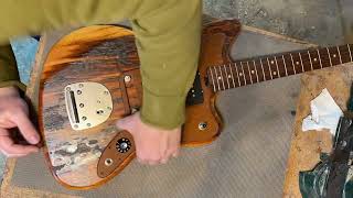 Assembling a Jazzmaster made from an old weathered door