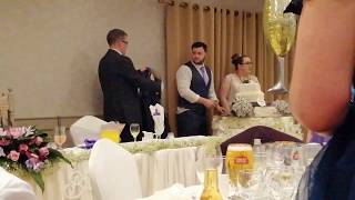 BEN AND KATRINA CUTTING THEIR WEDDING CAKE