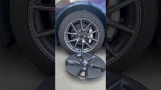 Comparison of stock wheel cover versus wheel center hub kit