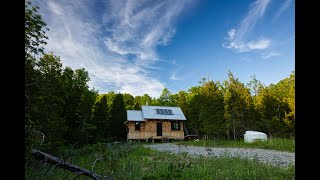 Chill Video of a Guy Building a Cabin in the Woods