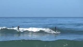 Surf in Cardiff, Ca winter 2019, me on left just taking off to my feet, blue Rusty Surfboard.