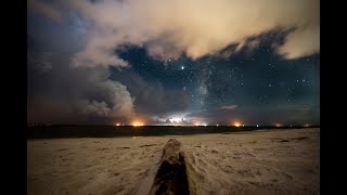 Captivating Timelapse: Milky Way and Lightning Unite on Dauphin Island, AL