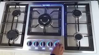 Cooktop with backlit knobs and LED strip