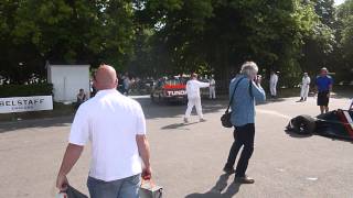 Cars Firing up and Leaving Assembly Bay Goodwood Festival of Speed 2014