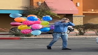 Man With Balloons vs The Wind. Will He Succeed? Have you ever been in this position before? 💨🎈🎈🎈🎈🎈🎈