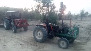 New Holland Fiat 640&Algazi  pulling out a heavy loaded trolley powerfully - Excellent powershow