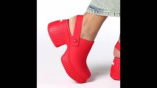 Showcasing the Red Ona Streetworks Slingback Platform Clogs by Sorel