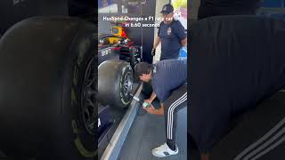 F1 Race weekend events in Vegas : Husband changes F1 race car tire in under 7 sec #f12023 #f1vegas