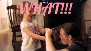 Toddler  cuts her mom's hair