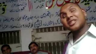 a blind boy singing song in a program urdu