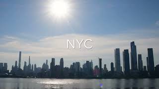 Morning sun over Manhattan skyline in 4k