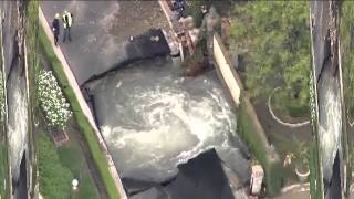 Water Main Break Leaves Pool of Water Swirling Beneath Street in Encino