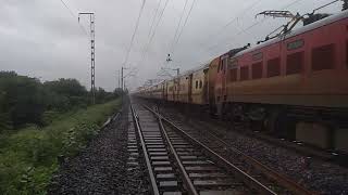 22905 okha Shalimar superfast with red beast skips Baikunth on a rainy day at full mps.#wap4.