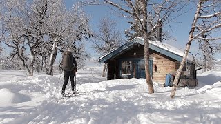 SKIING TO AN OFF-GRID CABIN - Sauna, ice bath and fire waffles