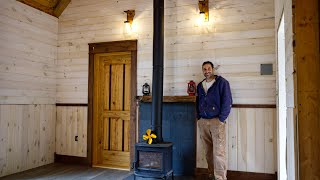 Walnut Craftsman Trim, One wall is finished! | Off Grid Cabin Build