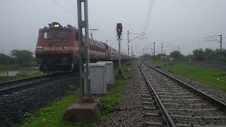 First run after lockdown. Shalimar LTT skips Bakal at 💯 kmph on a heavy rainy day.#wap4.