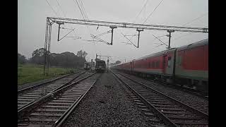 Dangerous WAP7 in heavy rain 🌧️ with CG sampark kranti skips Mandhar at full mps. #monsoon2022.