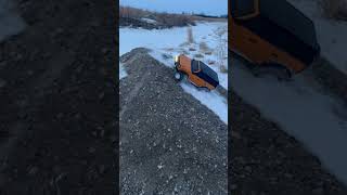 TRX 4 climbs up gravel pile