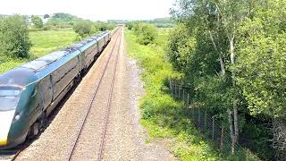 80X XXX of GWR pass Exminster overpass 27/5/23