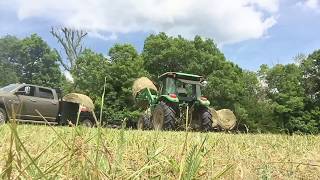 TIMELAPSE - stacking 6 tons of hay behind a truck