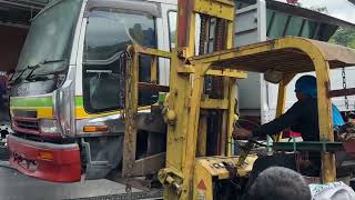 unloading a boom truck with forklift operators @InamRahman111