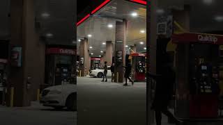 COP AND KIDS PLAYS BASKETBALL AT A QT GAS STATION AT NIGHT