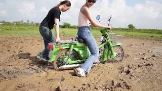 Girls in jeans stuck  | Stuck in mud