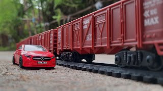 High Speed Freight Train of Indian Railways and Hot Wheels Mercedes Benz Car